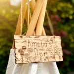 amelia's-den-wood-sign