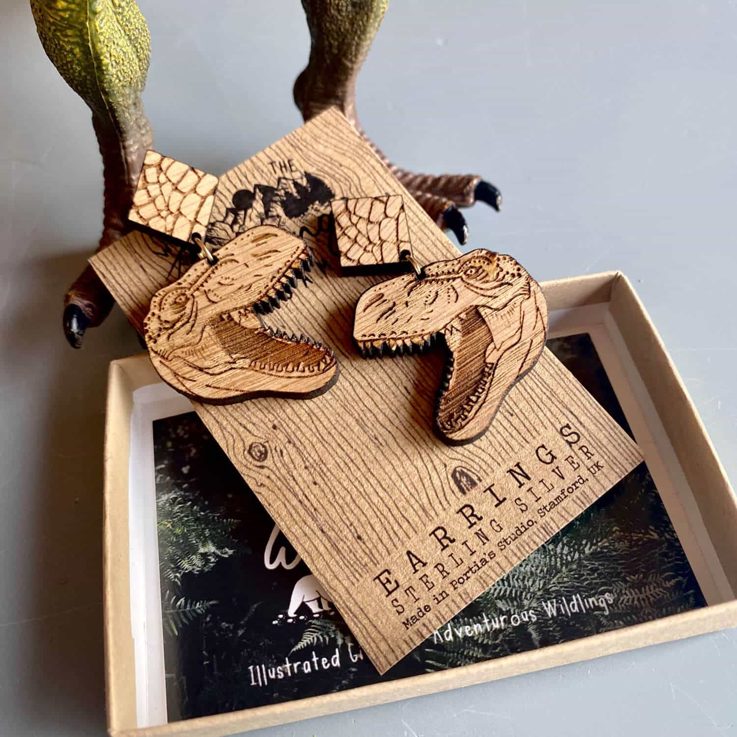 trex-earrings-wooden