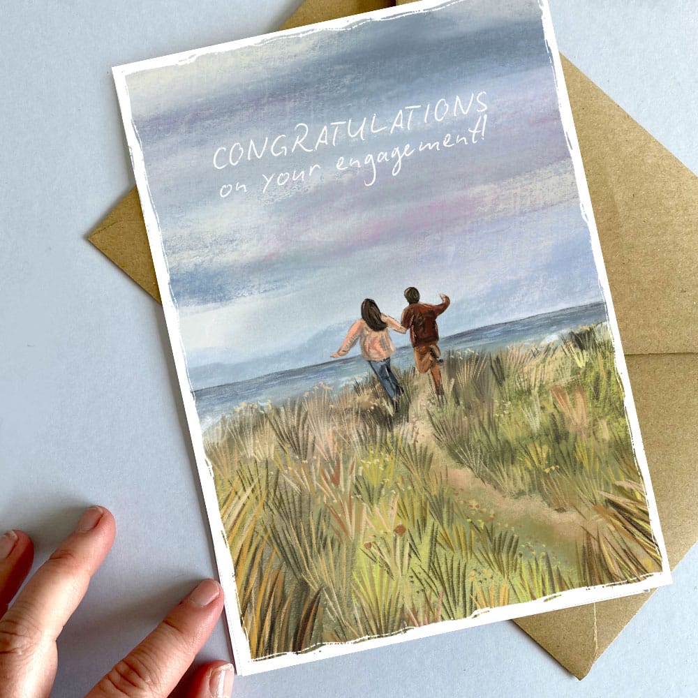congratulations-on-your-engagement-running-across-the-dunes-card